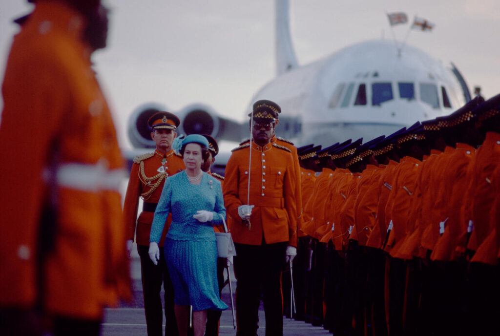 Queen Elizabeth II arrives in Kingston on a state visit. Jamaica. 1983. © René Burri / Magnum Photos