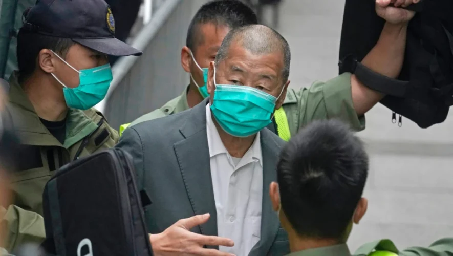 China critic and former media tycoon Jimmy Lai is sentenced to 20 years in a Hong Kong security case